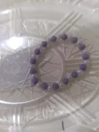 purple and white bracelet