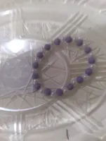 purple and white bracelet