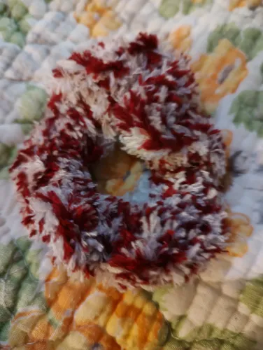 red and white furry scrunchie